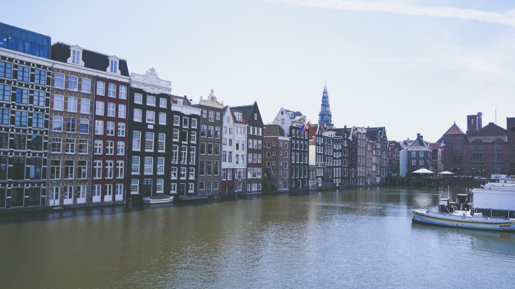 a body of water with buildings along it