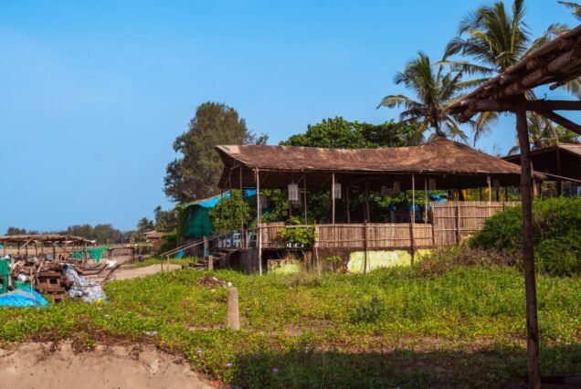 a house on the shore of a body of water