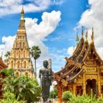 standing statue and temples landmark during daytime