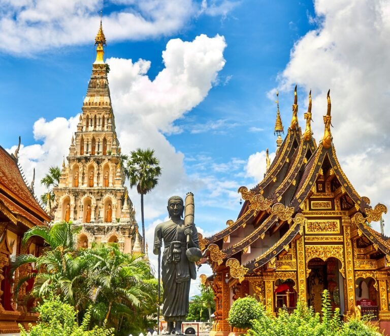 standing statue and temples landmark during daytime