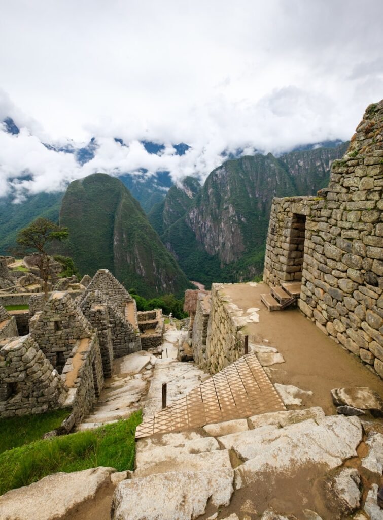 A view of a stone building in the mountains