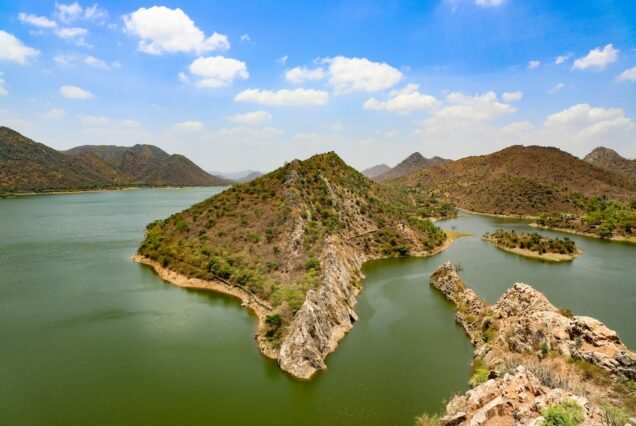 A large body of water surrounded by mountains