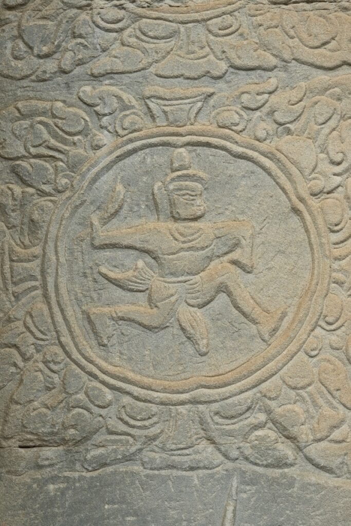 A close up of a carving on a wall