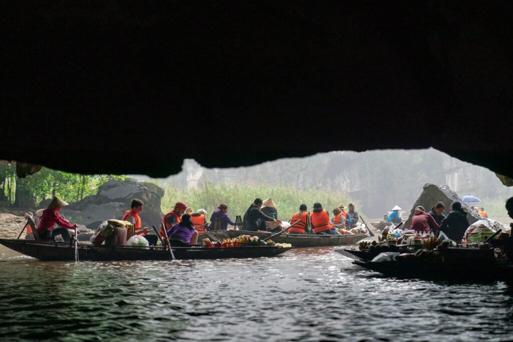 a group of people riding on top of a boat