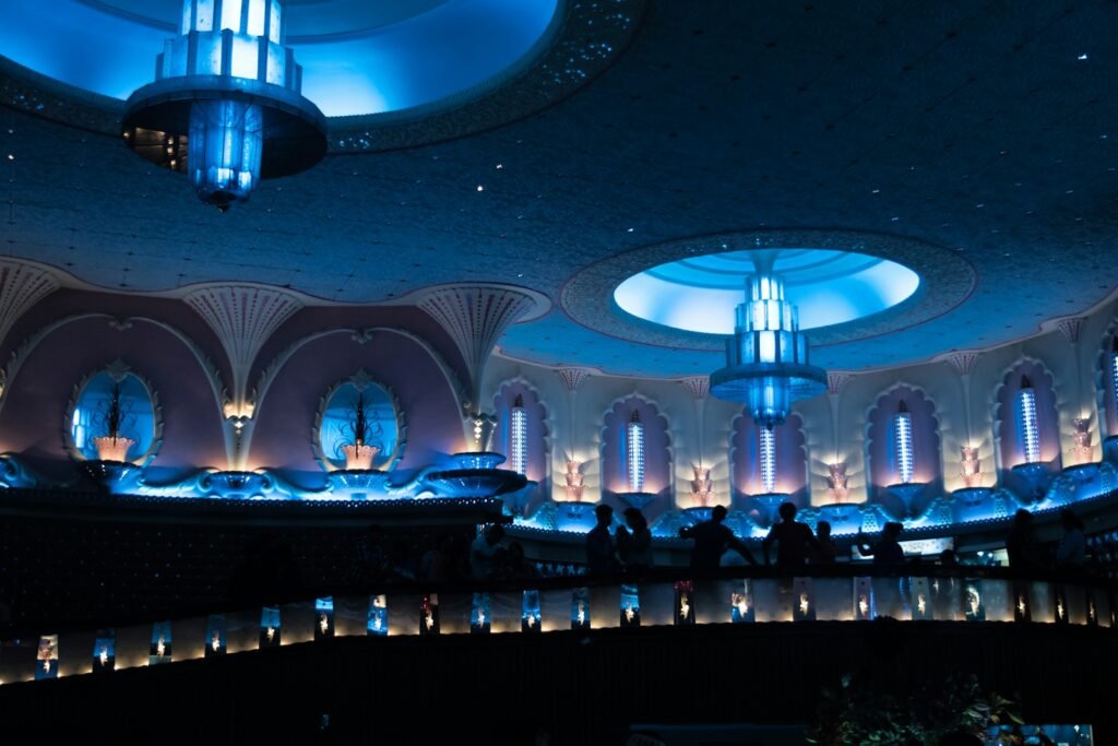 lighted hall with large light fixtures mounted on ceiling